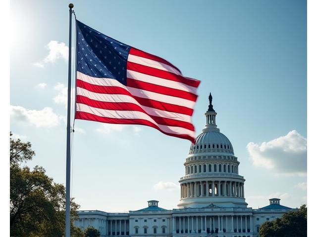 American flag waving against Capitol Building